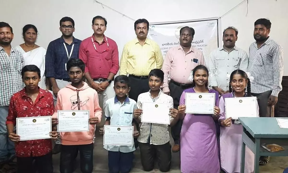 The winners of quiz competition, organised by Union Bank of India at SKVT Government High School in Rajamahendravaram on Wednesday