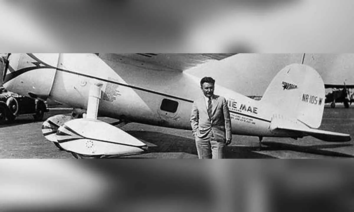 Aviator Wiley Post takes off to break world record