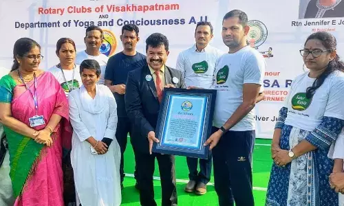 Mass yoga demonstration by differently-abled persons earns a place in the International Wonder Book of Records in Visakhapatnam