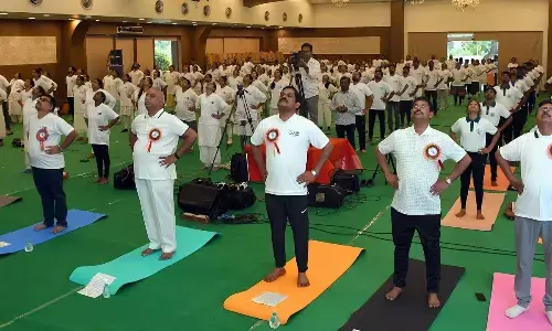 Medical and Health Special Chief Secretary MT Krishna Babu, Collector S Dilli Rao, MLA Malladi Vishnu, former Minister Vellampalli Srinivas, Mayor Rayana Bhagyalakshmi and others  participating in International Yoga Day programme at A Convention Centre in Vijayawada on Wednesday  Photo: Ch Venkata Mastan