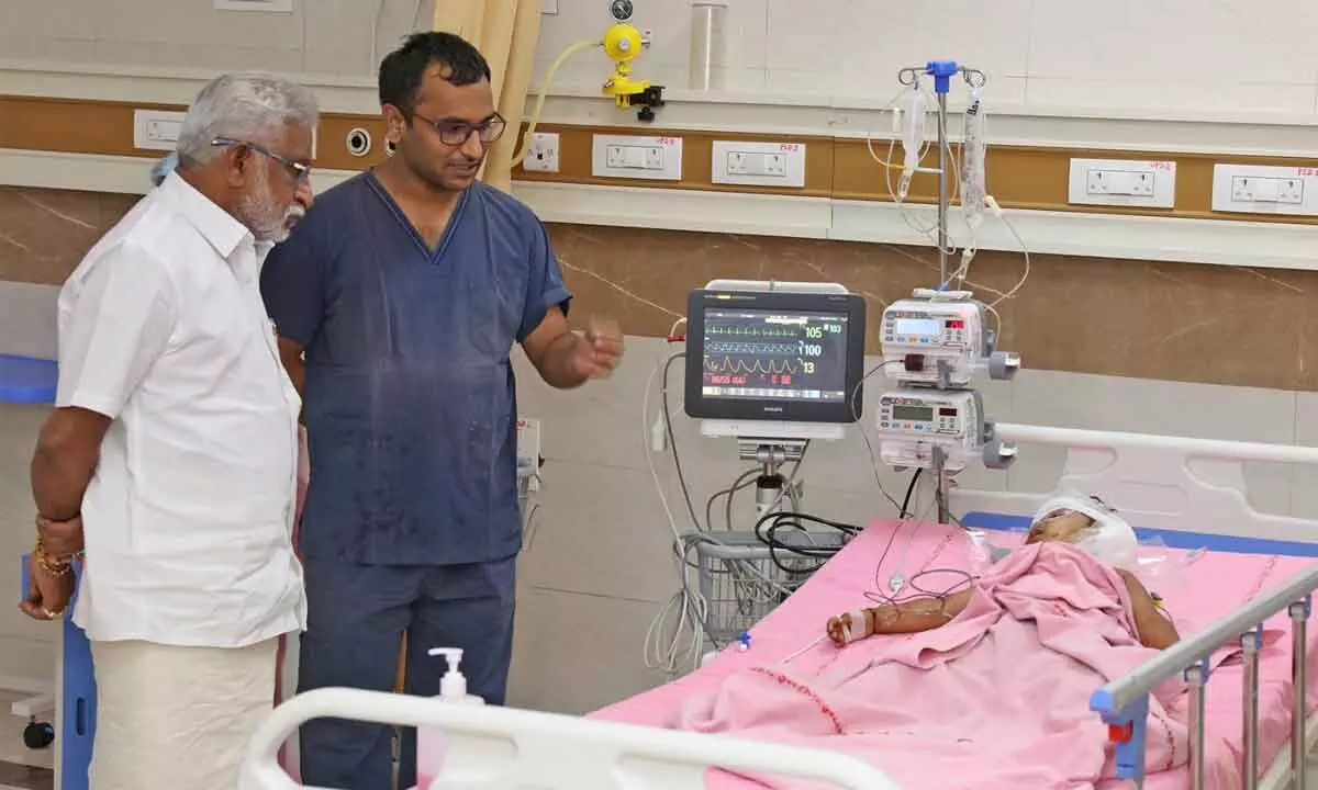 TTD chairman YV Subba Reddy visiting the boy Kaushik at hospital in Tirupati on Friday.