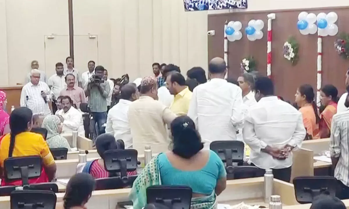 TDP and YSRCP corporators pushing one another in the GMC council meeting on Friday