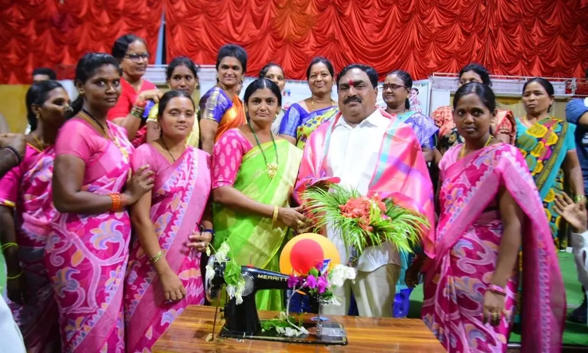 Minister for Panchayat Raj and Rural Development Errabelli Dayakar Rao at the distribution of the sewing machines to the women who completed training in tailoring at Singarajupally under Devaruppula mandal in Palakurthi constituency on Saturday