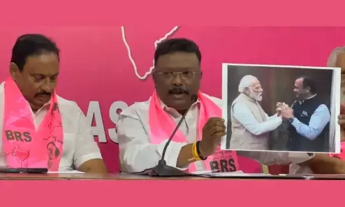 Addressing a press conference at Telangana Bhavan, BRS leaders D Sravan Kumar and MLA D Nagender.