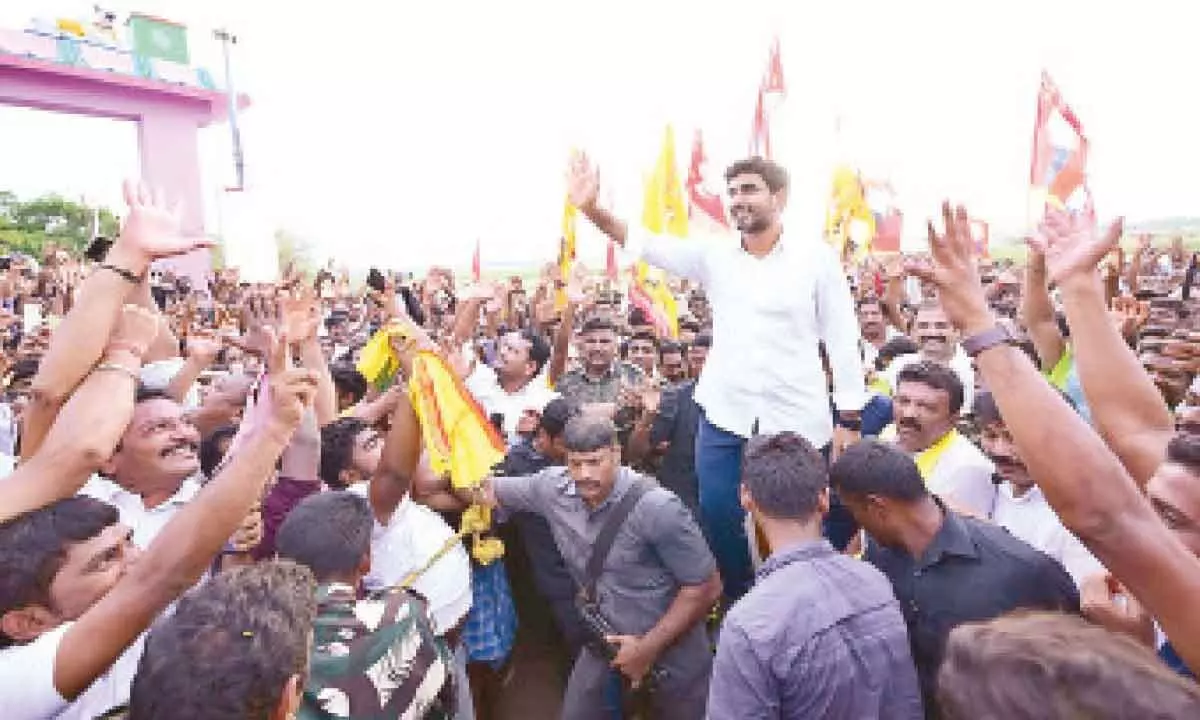 TDP national general secretary Nara Lokesh greeting people at Naidupet in Sullurpet Assembly constituency on Sunday