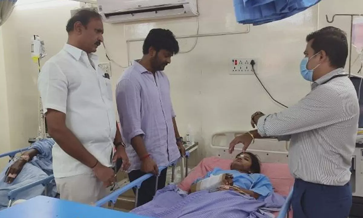 DCC president Makkan Singh Raj Tagore visiting the  persons injured in a bus accident at a hospital in Peddapalli on Monday