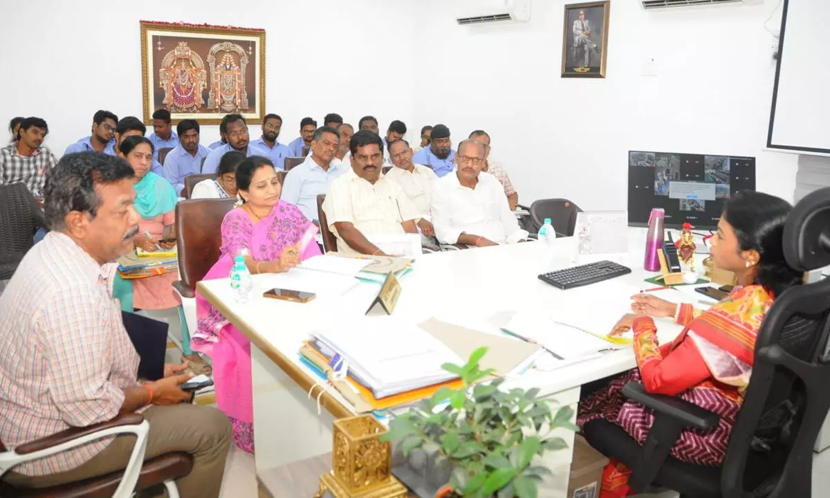 Municipal Commissioner D Haritha holding a meeting with officials at the Corporation office in Tirupati on Tuesday