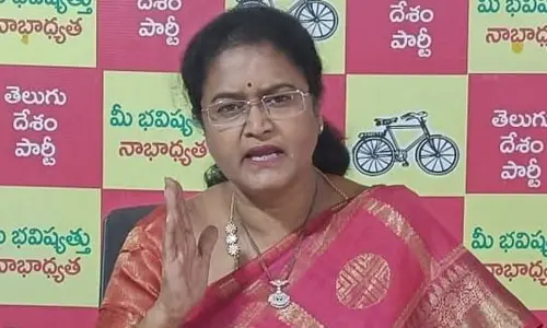 Telugu Mahila State official spokesperson Y Suchitra addressing the media in Vijayawada on Tuesday