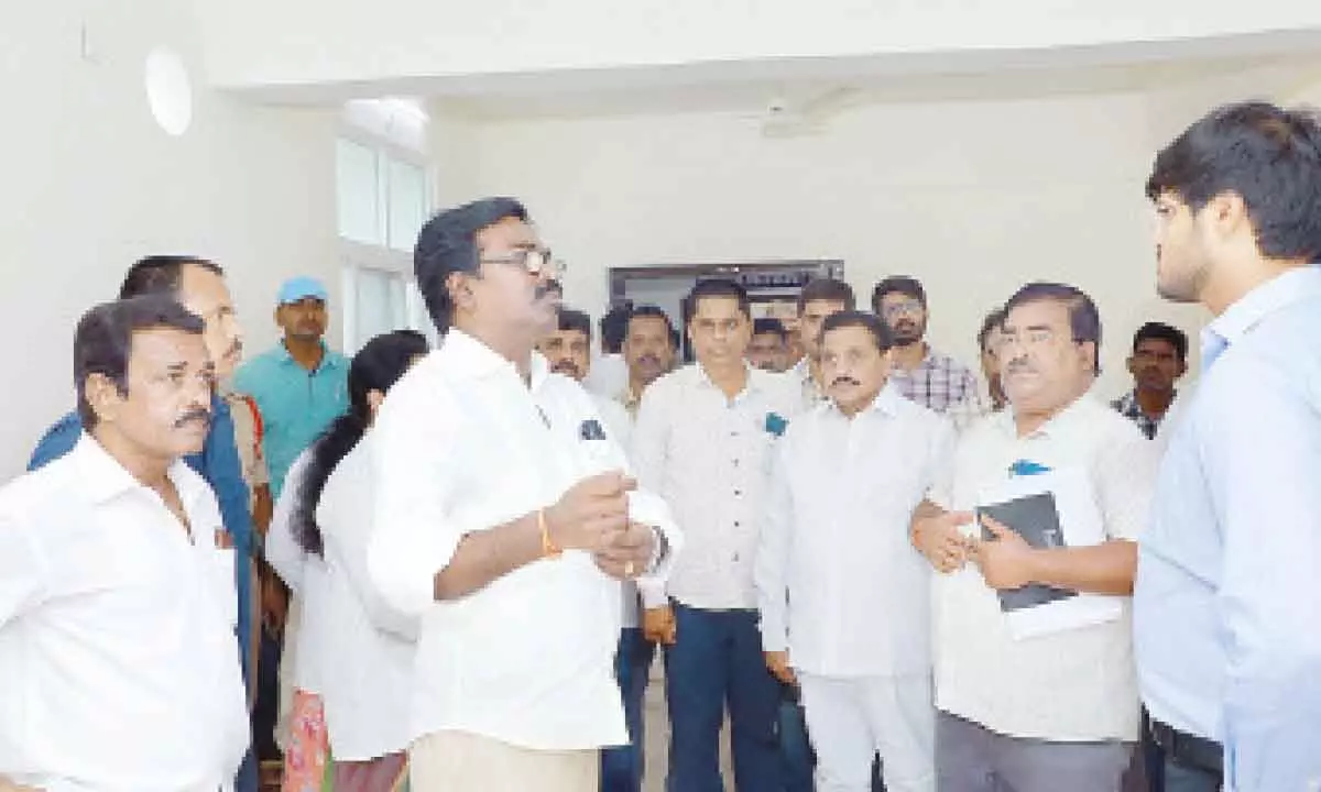 Transport Minister Puvvada Ajay Kumar inspecting the ongoing constructions works of the new medical college in Khammam on Wednesday