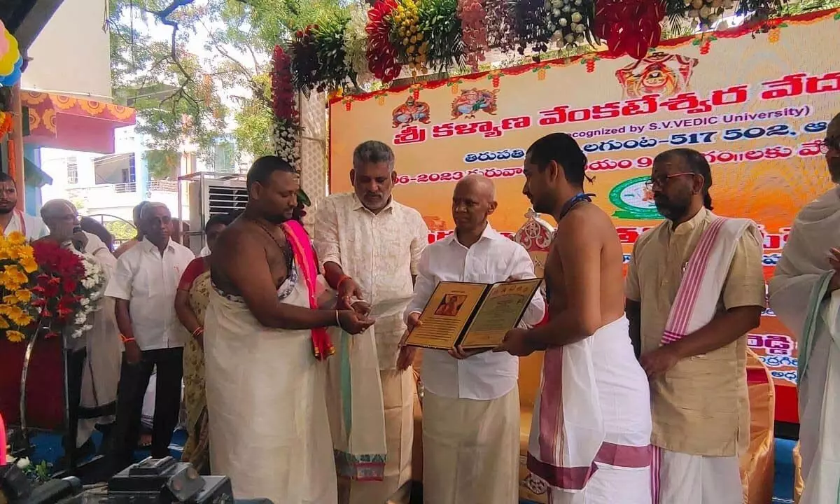 TTD Executive Officer A V Dharma Reddy presenting certificate to a student at the first convocation of Kalyana Venkateswara Veda Patasala in Tummalagunta on Thursday