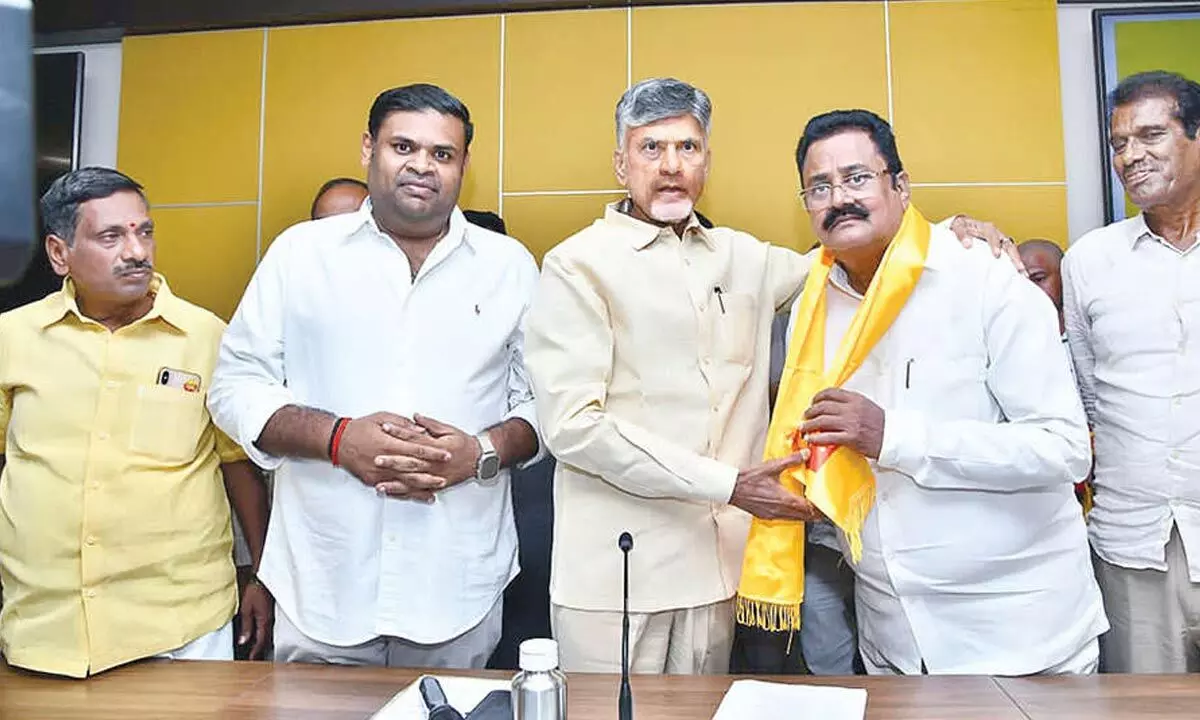 TDP chief N Chandrababu Naidu welcoming former Srikalahasti MLA S C V Naidu into the party at Amaravati on Thursday. Srikalahasti TDP in-charge B Sudheer Reddy and Tirupati parliamentary president G Narasimha Yadav are also seen.