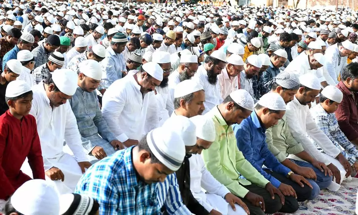 Muslims offer prayers on the occasion of Eid al-Adha festival at the IGMC stadium in Vijayawada on Thursday.  			         Photo: Ch Venkata Mastan