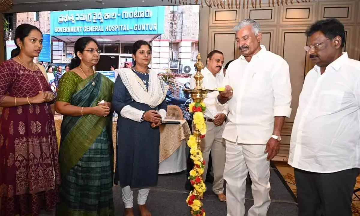 Minister Peddireddi Ramachandra Reddy lighting the lamp to mark the inauguration of national electrical safety week celebrations in Tirupati on Friday. CEIG Vijaya Lakshmi, APSPDCL CMD K Santosh Rao and others are seen.