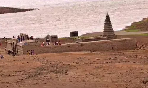 Temple visible after 12 years due to deficit rainfall; devotees overjoyed