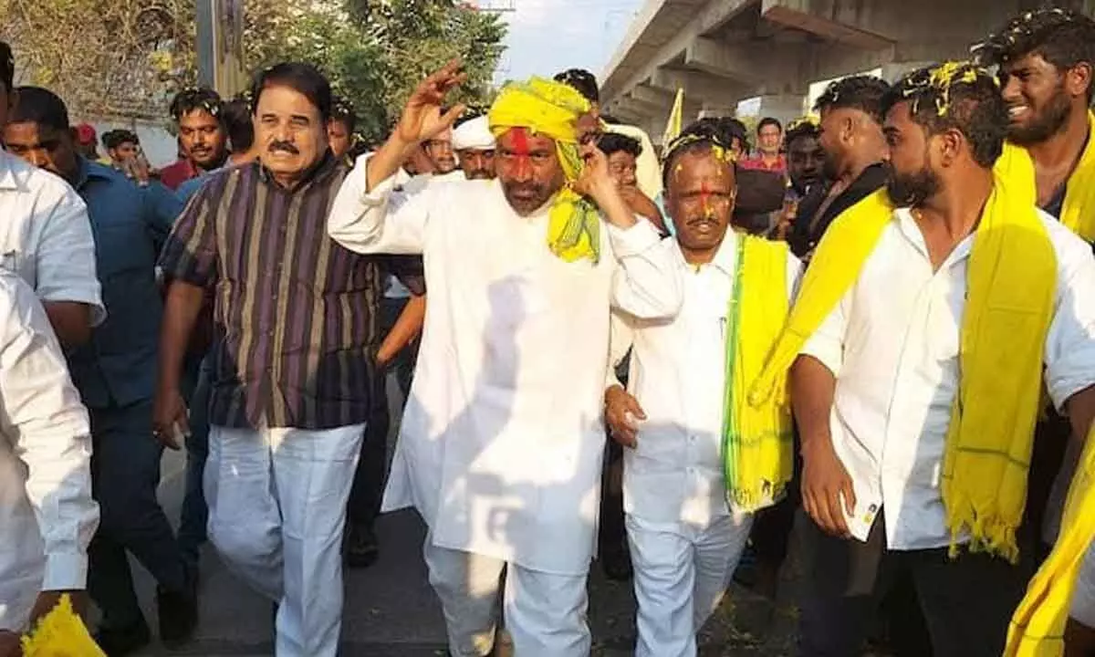 TDP leader Prabhakar Chaudhary connects with people along with Palle Raghunath Reddy, during Bus yatra in Anantapur  on Sunday
