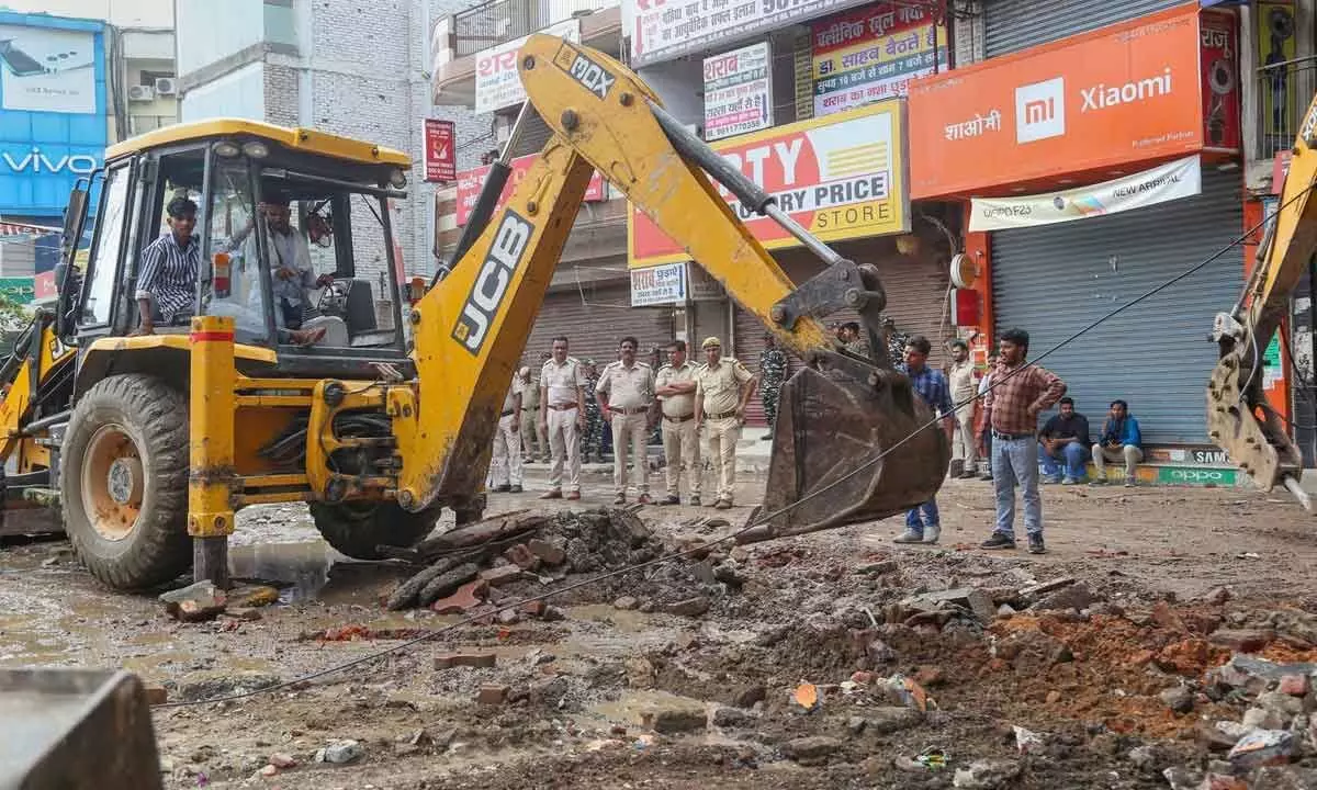 Temple, mazaar removed in Bhajanpura for flyover