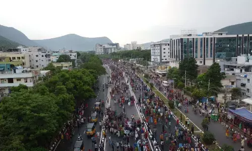 Scores take part in Giri Pradakshina in Visakhapatnam on Sunday. photo: Balivada Gopi Krishna