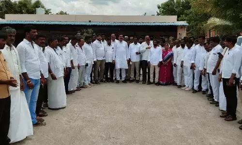 Panchayat Sarpanches under the banner of AP Grama Panchayat Sarpanches Sankshema Sangam staging a protest at Panchayat Raj Commissioner’s office in Tadepalli on Monday
