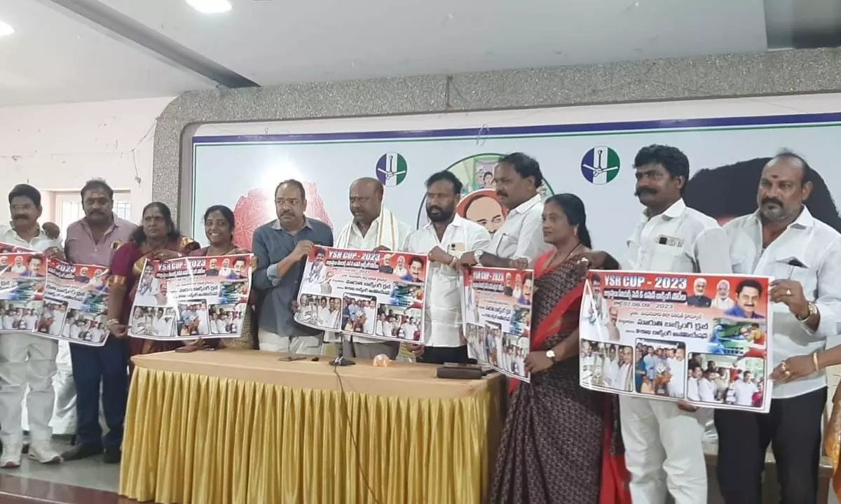 YSRCP Visakhapatnam district president Panchakarla Ramesh Babu along with others unveiling a poster of the 10th YSR Cup– 2023 in Visakhapatnam on Monday