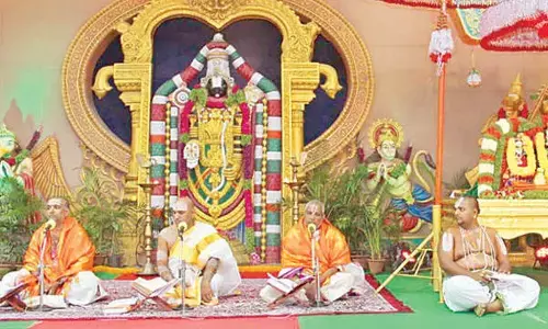 Prof Kuppa Viswanatha Sharma, Maruti and Seshacharyulu at Bhagavatha Parayanam held in Tirumala on Monday.