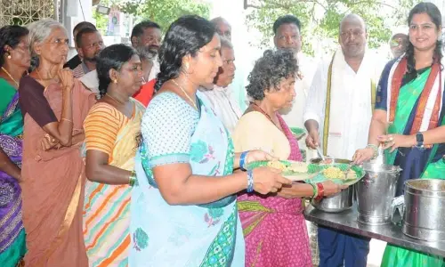On the occasion of Guru Purnima, free meals being distributed to the devotees at Godada Gosaibaba Math in Pushkarghat of Rajamahendravaram on Monday