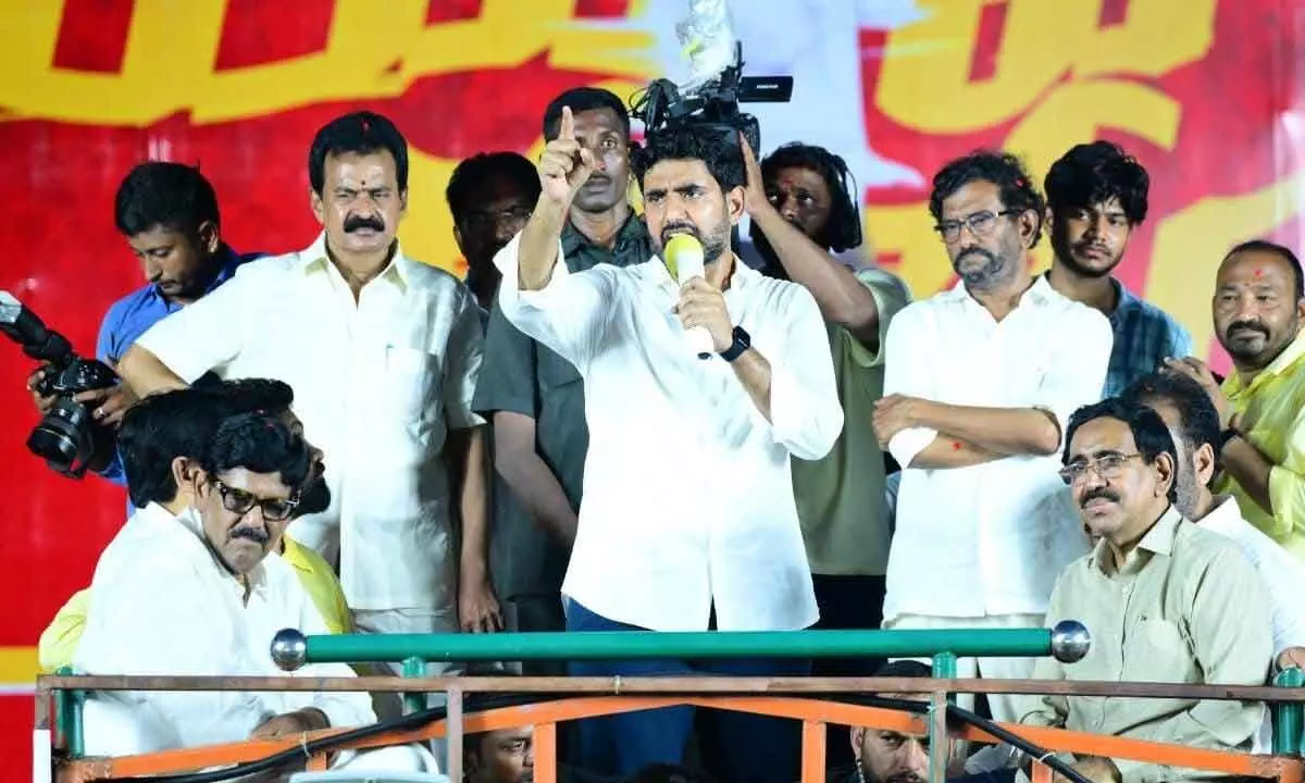 As part of Yuva Galam Padayatra, TDP national general secretary Nara Lokesh addressing a public meeting at VRC Centre in Nellore city on Tuesday