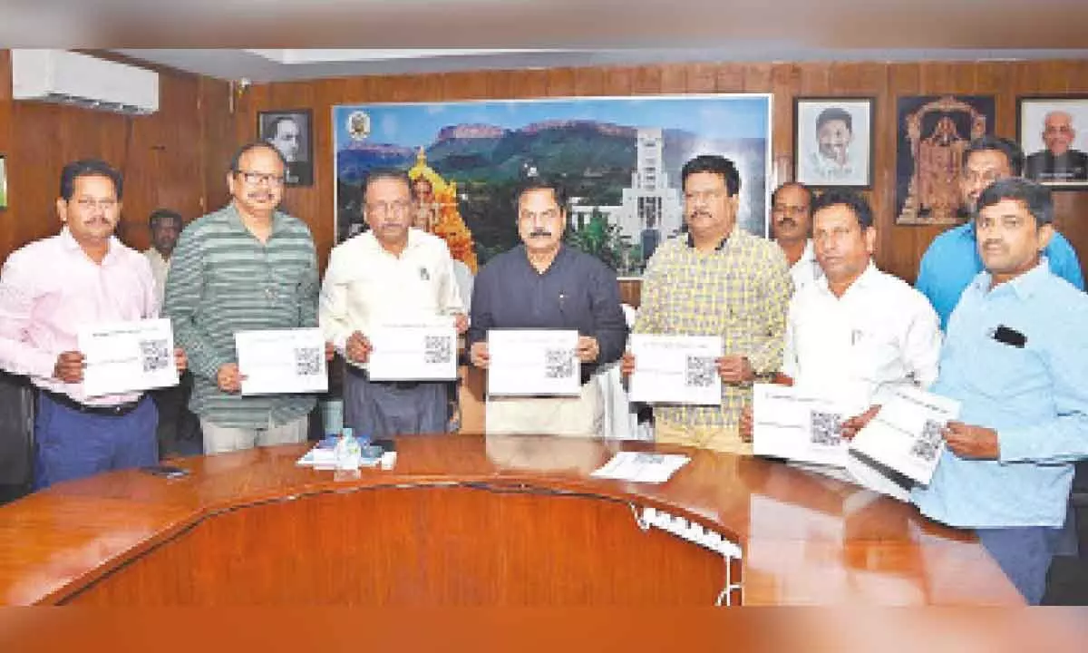 SV University Vice Chancellor Prof K Raja Reddy, Registrar Prof OMd Hussain, Examinations Dean Prof Kishore, CE M Damla Naik and others releasing the QR code in Tirupati on Wednesday.