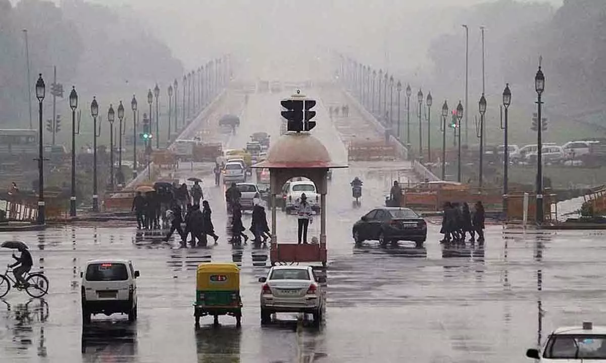 Rain lashes Delhi, temp drops to 26 degrees
