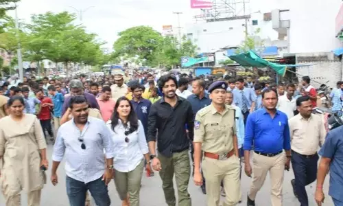 Balagam movie team takes a selfie with students at a programme in Sircilla on Wednesday