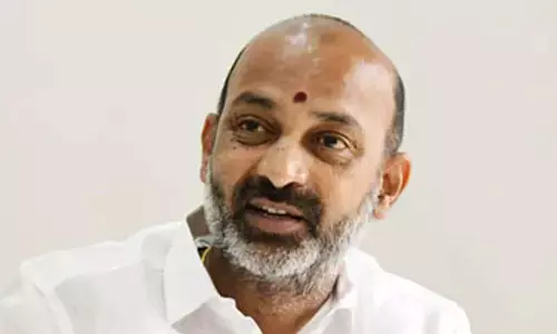 Bandi Sanjay speaking at the launch of Amrit Bharat Station scheme at Karimnagar railway station on Sunday