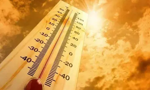 China renews orange alert for high temperatures