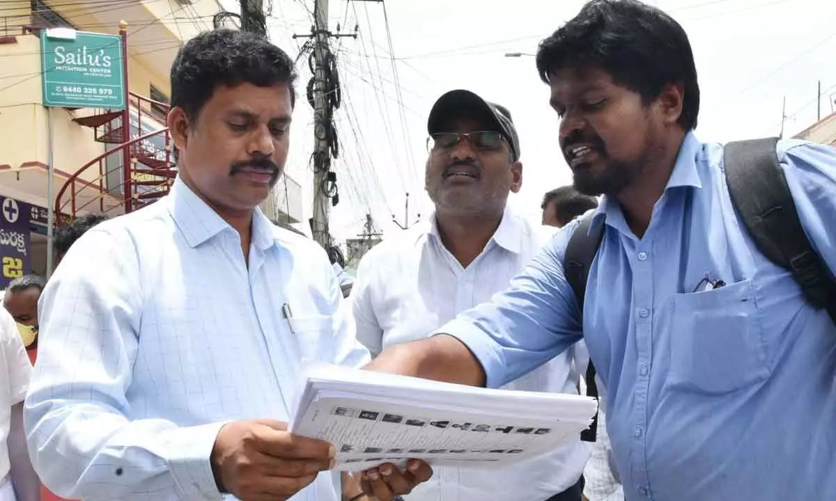 NTR district Collector S Dilli Rao verifying voters list in Vijayawada on Friday