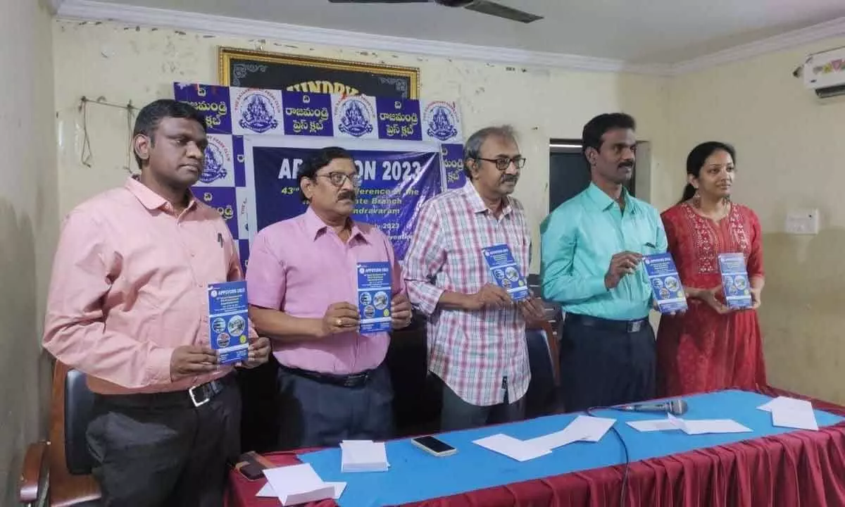 Dr Karri Rama Reddy, Dr Endluri Prabhakar and others releasing brochure of State-level conference of psychiatrists, at Press Club in Rajamahendravaram on Friday