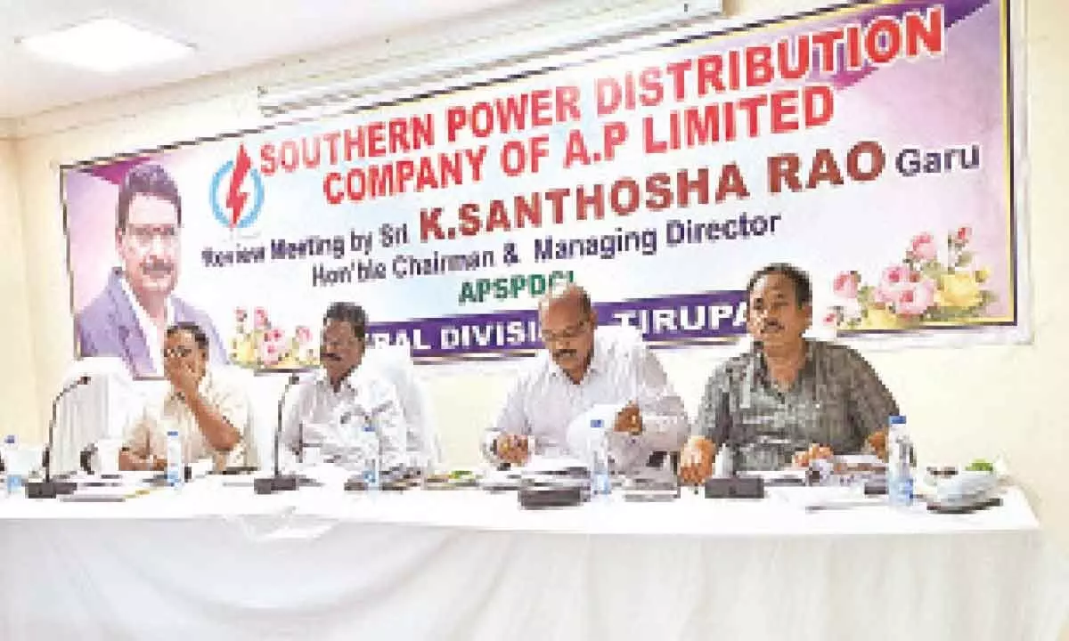 APSPDCL CMD K Santhosh Rao addressing a review meeting in Tirupati on Friday.