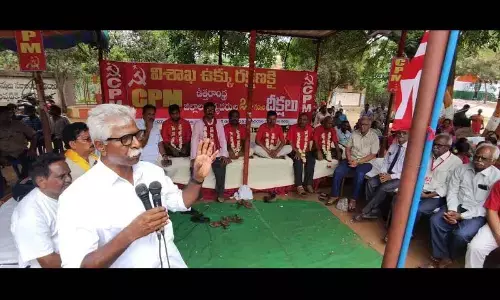 CPM state secretary V Srinivasa Rao speaking at the hunger strike camp launched in Visakhapatnam on Friday
