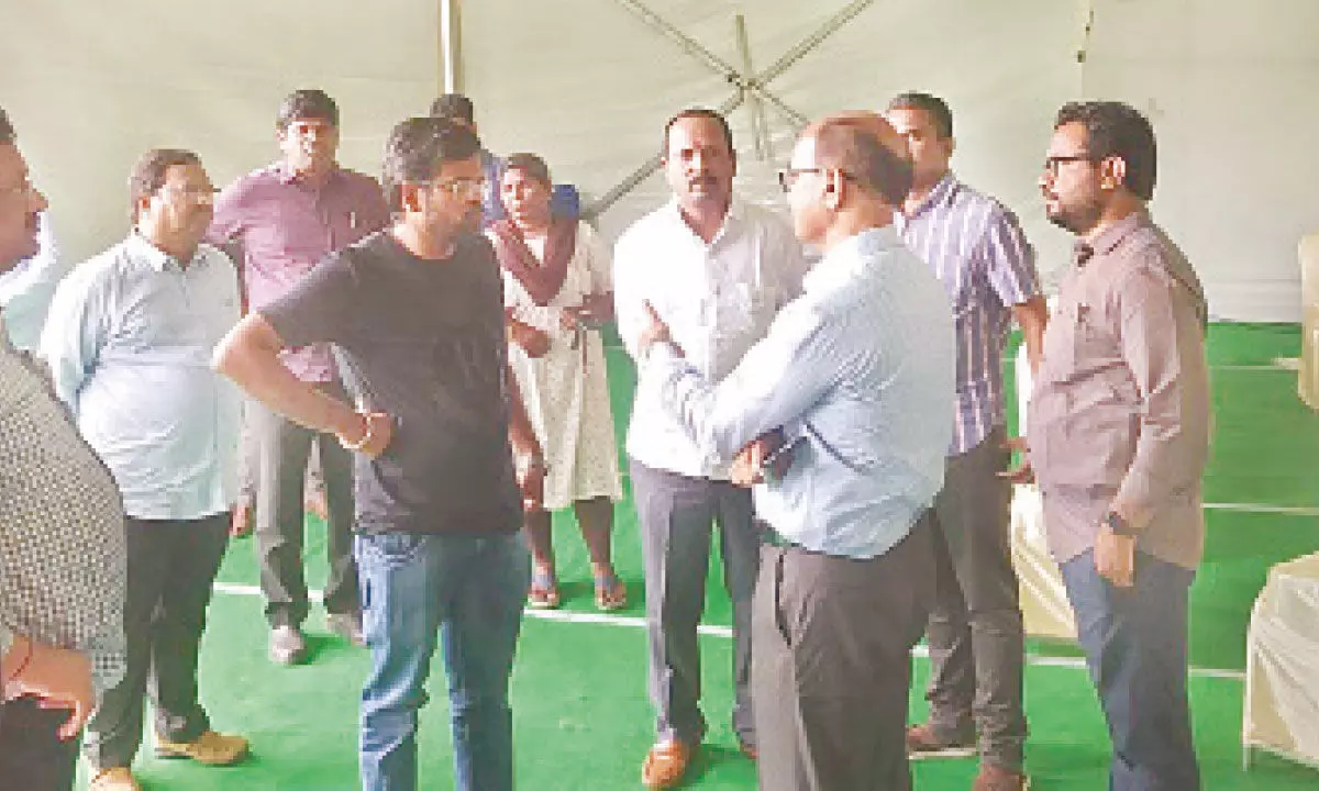 Joint Collector D K Balaji reviewing the arrangements for the foundation stone laying ceremony of Oberoi Group of Hotels in Tirupati on Saturday. DRO Kodandarami Reddy and other officials are seen.