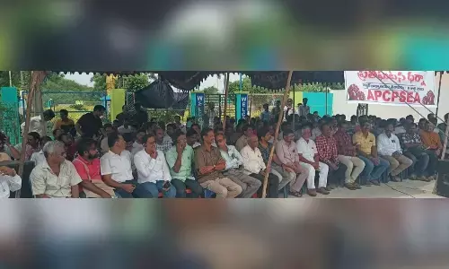 Employees of various departments staging agitation in front of collector’s  office in Srikakulam on Saturday