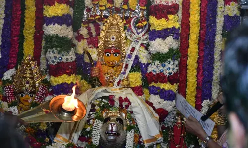 Devotees line up towards Sri Ujjaini Mahankali Temple on the occasion of Lashkar Bonalu