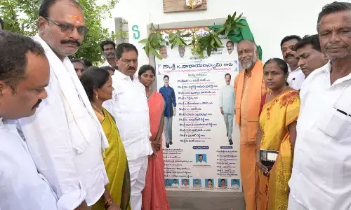 Deputy Chief Minister K Narayana Swamy laying foundation for protected drinking water scheme at Vedurukuppam mandal on Monday. ZP chief G Srinivasulu and others are seen.