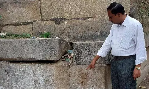 Historian  MyNaa Swamy showing the Penukonda Fort  inscription