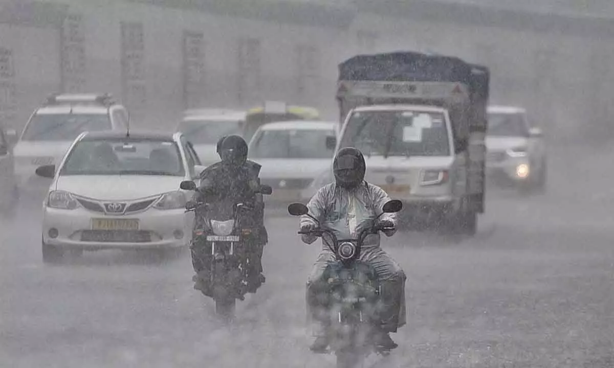 Rains playing havoc with road users in Delhi.