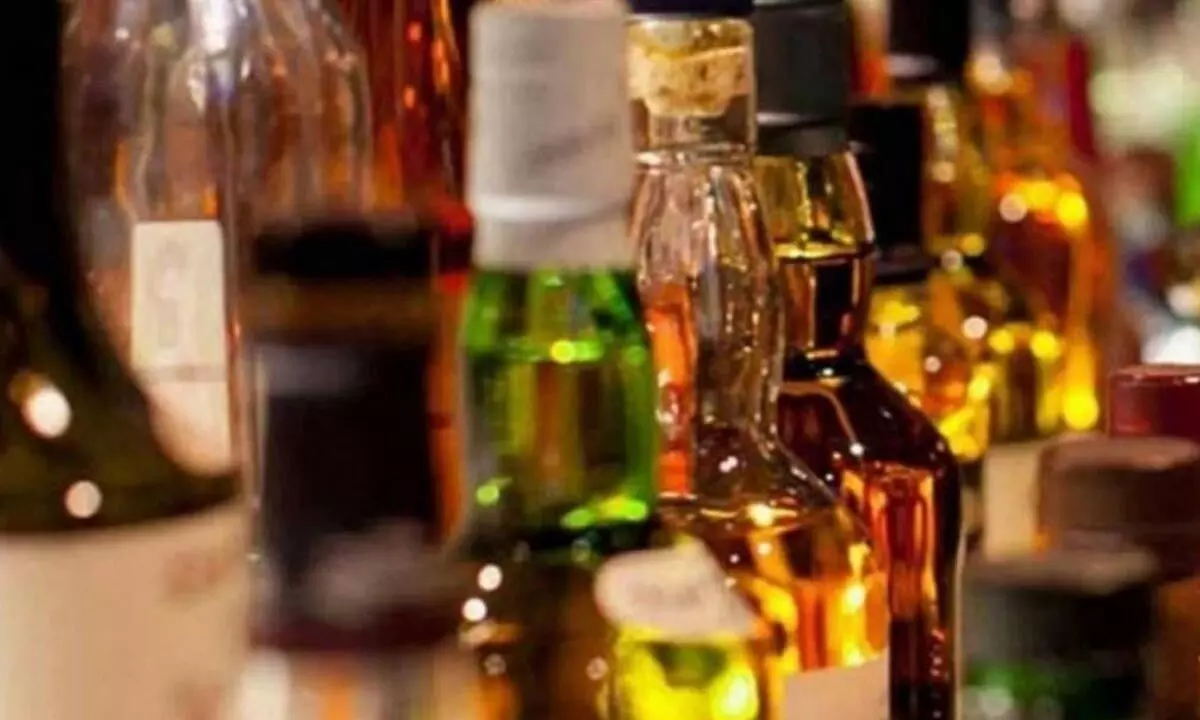 Tipplers in Udupi launch novel Protest booze Price Hike Demand 90ml Free Alcohol Twice a Day