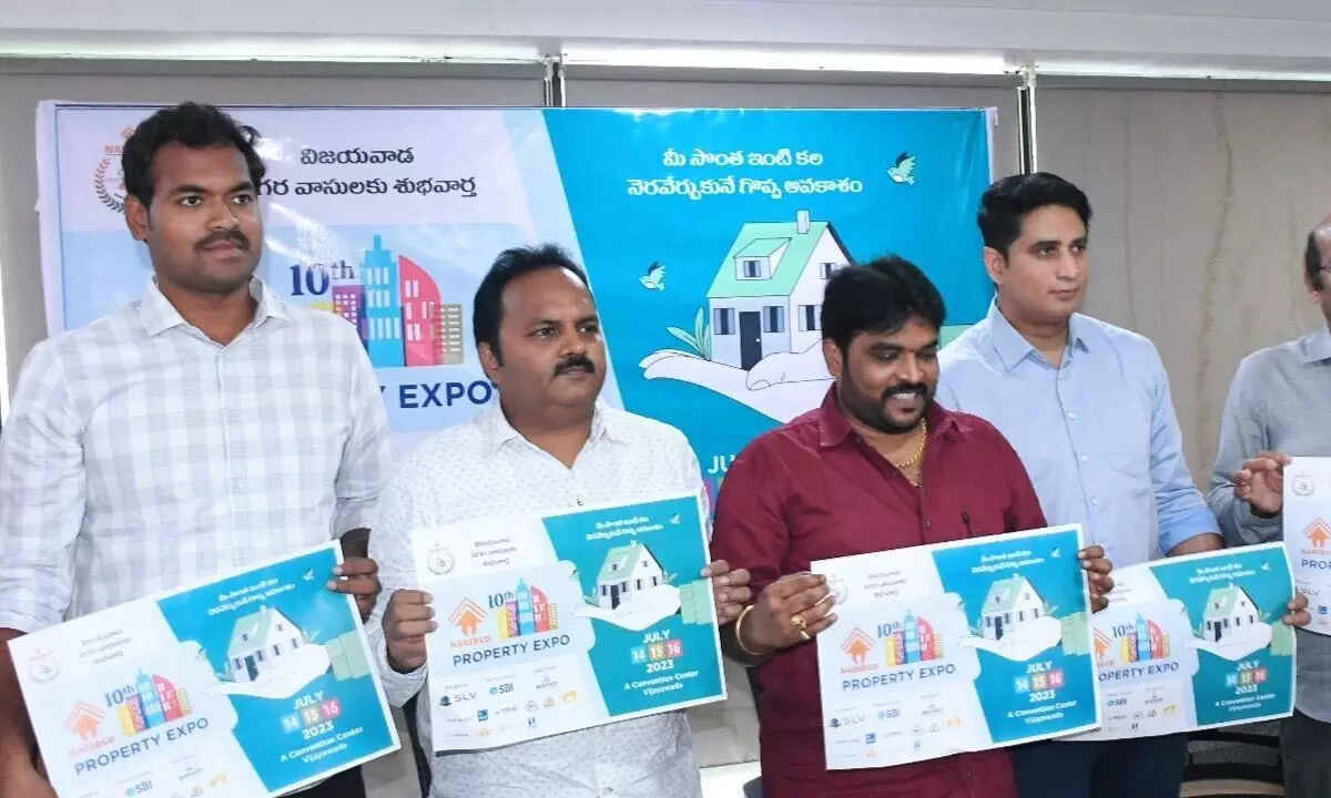 Naredco members releasing brochures of the property show, in Vijayawada on Wednesday