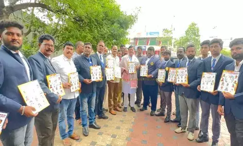 BJP MP GVL Narasimha Rao unveiling South India 8th Wadokai Karate Competition poster in Visakhapatnam on Wednesday