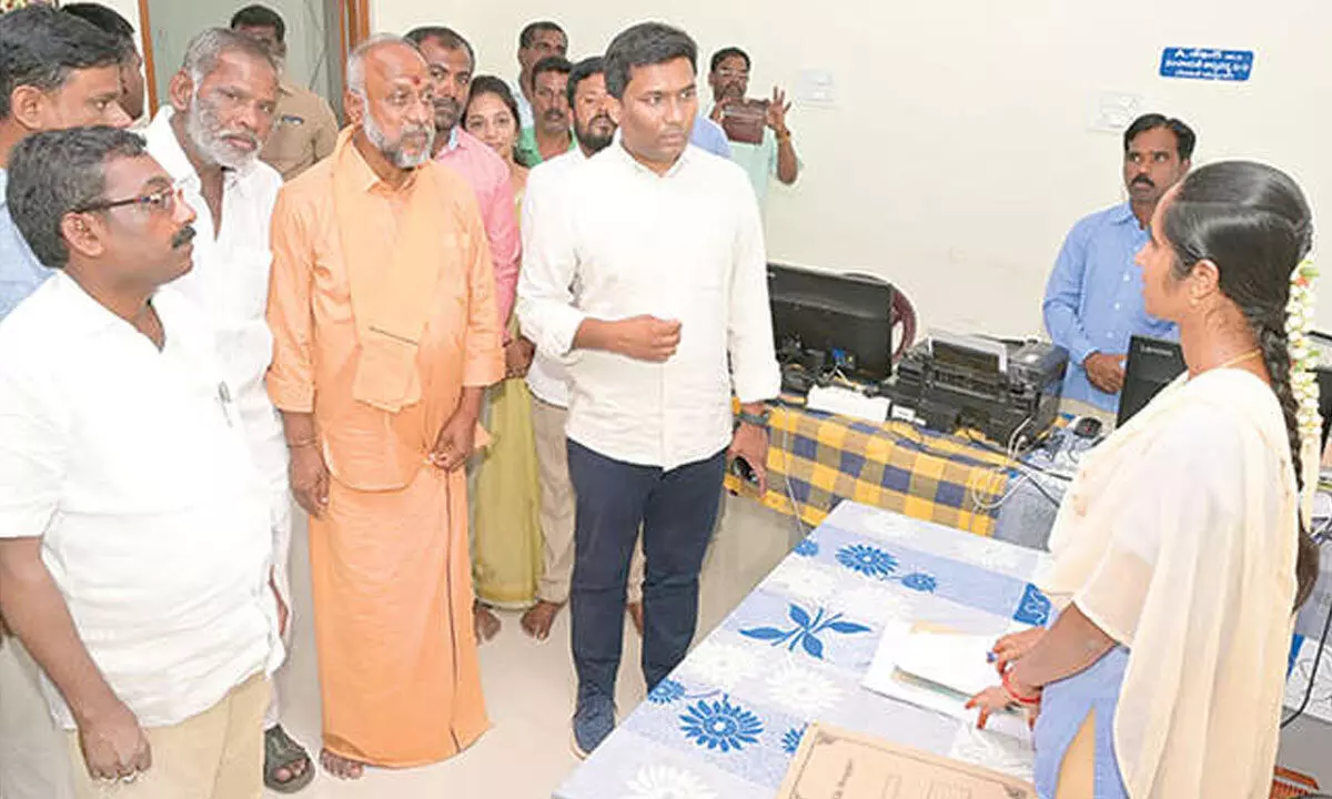 ZP Chairman  G Srinivasulu  and District  Collector  S  Shanmohan inspecting Peddapanjani Sachivalam in Palamaner on Wednesday