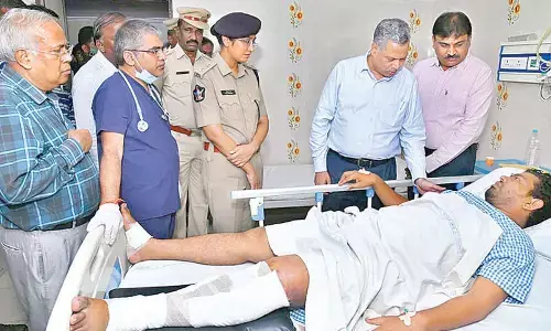 RTC MD Ch Dwaraka Tirumala Rao and SP Malika Garg interacting with the bus accident victims at KIMS in Ongole on Wednesday