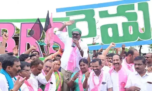 Transport Minister Puvvada Ajay Kumar speaking in a massive protest in Khammam on Wednesday