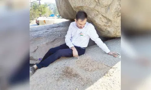 Pre-Ashokan era rock paintings discovered on a boulder at Jubilee Hills