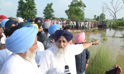 Sukhbir Badal visits flood-hit villages along Pakistan border, blames govt for releasing water