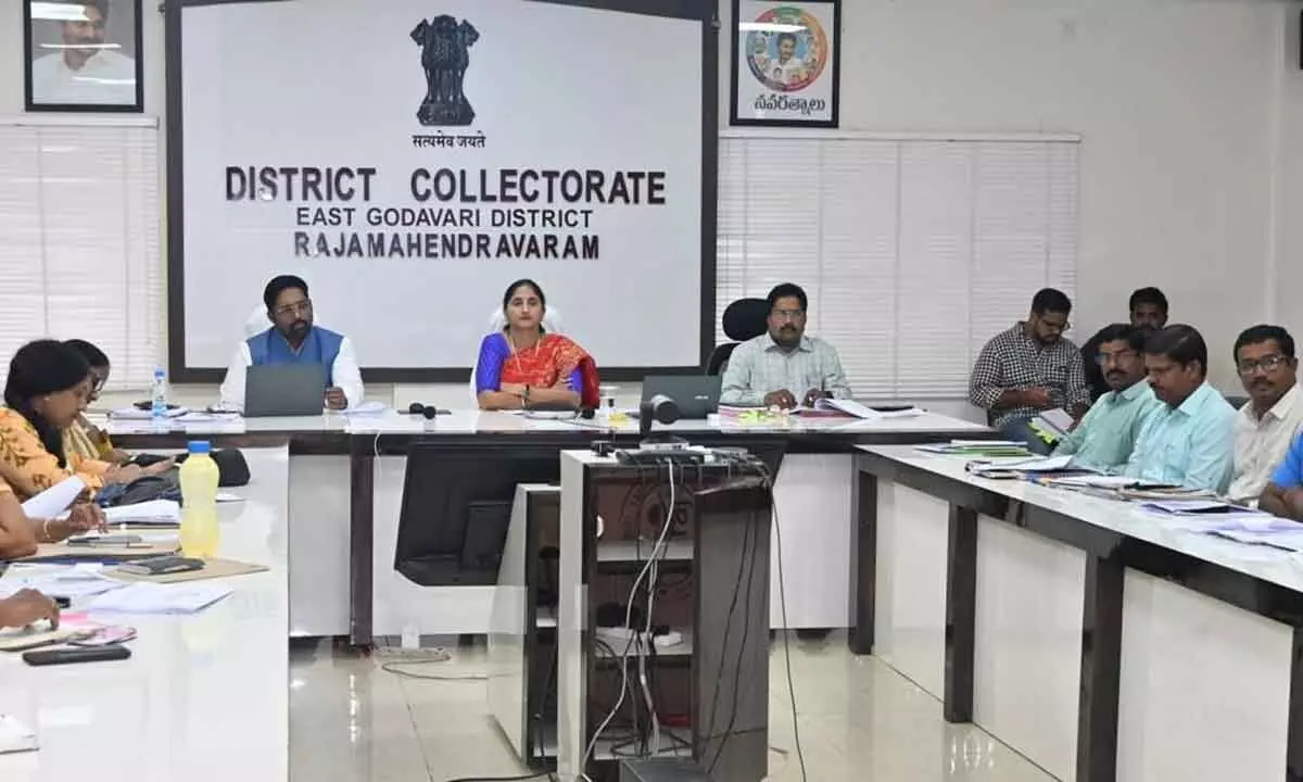 District Collector Dr K Madhavi Latha, Joint Collector Tej Bharat and other officials participating in a videoconference from the Collectorate in Rajamahendravaram on Friday